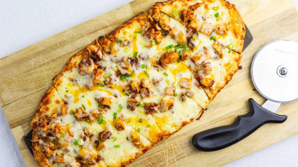 Bourbon Bbq Chicken · Sweet and tangy bourbon BBQ sauce with chicken, mozzarella, cheddar, bacon, and green onion.