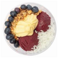 Tropicalicious Bowl(Dairy Free) · 2 oz(#) scoop of Acai+pineapple sorbet topped with  granola+Banana+coconut