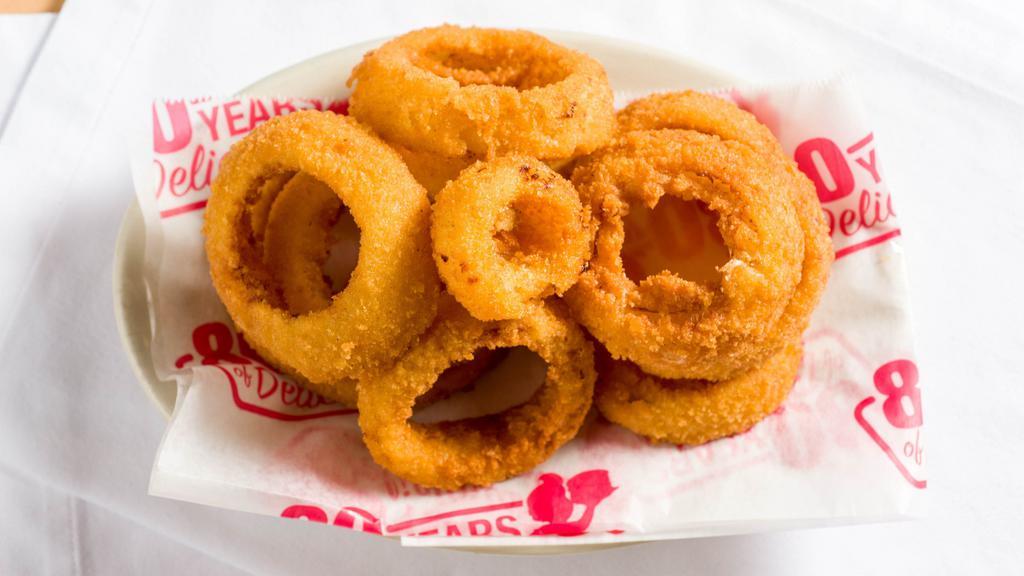 Original Onion Rings · served with zesty sauce.