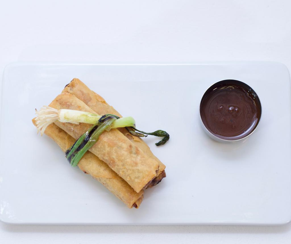 Spring Roll (3) · Large size pastry sheet wrapped with shredded vegetables and chicken.