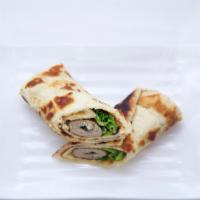 Reshmi Kabab Roll · Minced and skewered chicken kabab wrapped inside a Paratha with lettuce and caramelized onio...