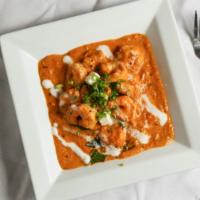 Shrimp Masala · Shrimp sautéed with an onion and tomato-based curry with fresh cream and authentic spices an...