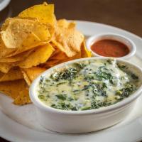 Spinach & Artichoke Dip · spinach and artichokes in a parmesan cream sauce, served with warm tortilla chips