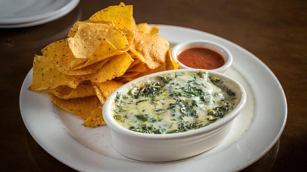Spinach & Artichoke Dip · spinach and artichokes in a parmesan cream sauce, served with warm tortilla chips