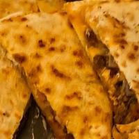 Jumbo Chicken Quesadilla · Flour tortilla oozing with mozzarella, cheddar cheese and grilled onion filled with grilled ...