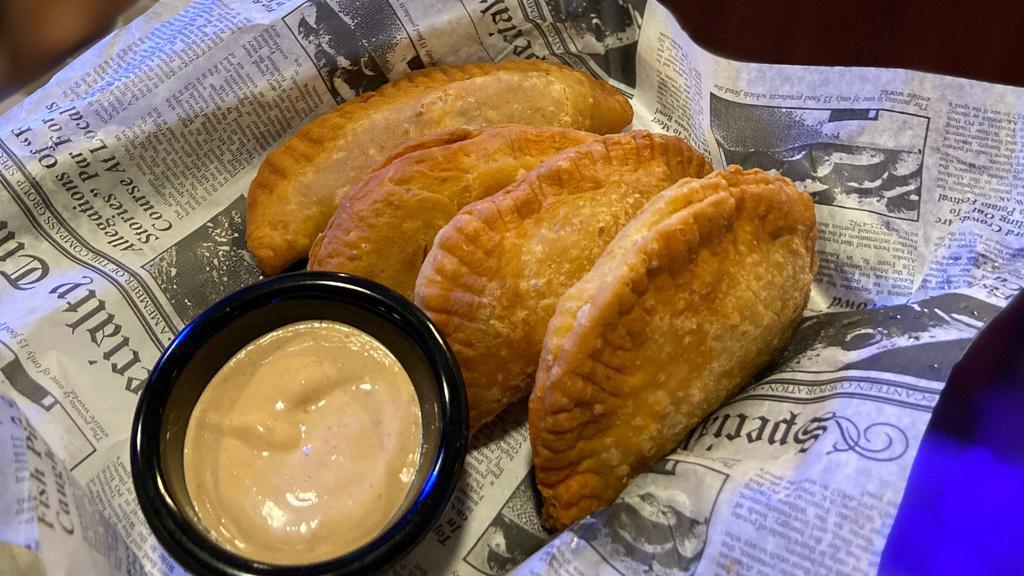 Traditional Latin Beef Empanadas · Four served with your choice of side. The Original 