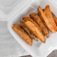 Wedges · Our famous freshly cut potato hand-breaded in our Uncle Larry's breading, and pairs great wi...