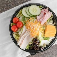 Chef Salad · Fresh salad with strips of oven roasted turkey & ham, cherry tomatoes, sliced cucumbers, str...