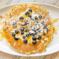 Blueberry Lemon · Two large pancakes embedded with fresh blueberries and lemon infused cream cheese in between...