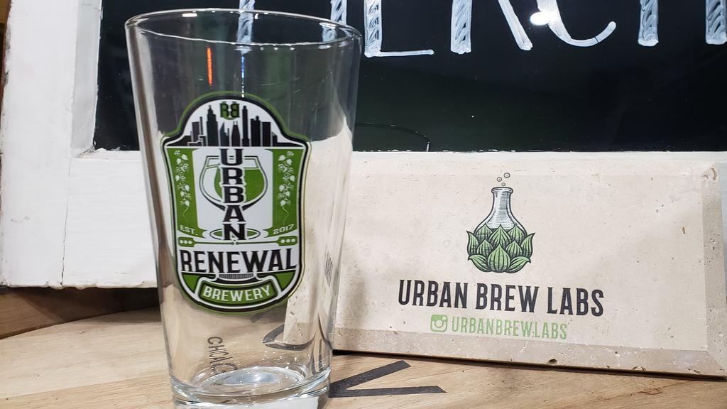 Pint Glass · Pint glass featuring our large standard logo.