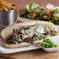 Philly Cheese Steak · Served with green peppers, onions, and swiss cheese