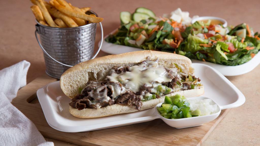 Philly Cheese Steak · Served with green peppers, onions, and swiss cheese