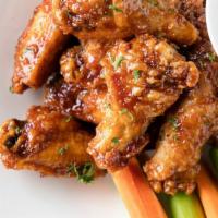 Chicken Wings · sauce of choice of buffalo, bourbon bbq, bbq, or tangy peach bbq + celery + carrots + choice...