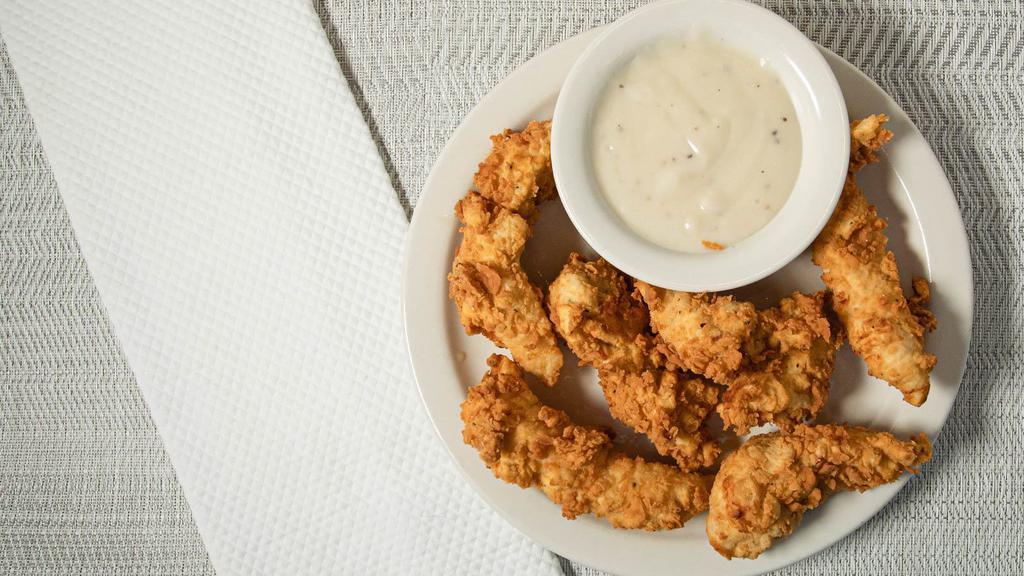 Chicken Tenders · Buttermilk dipped, hand battered chicken tenders served with choice of dipping sauce.