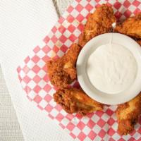 Buffalo Wings · Choose your sauce from mild or hot buffalo, with celery sticks and your choice of blue chees...