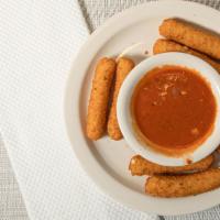 Fried Cheese · Fried cheese sticks with marinara sauce, eight pieces.