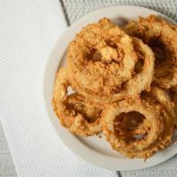 Onion Rings · Crispy onion rings served with okie sauce.