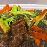 Beef With Broccoli芥蓝牛 · Served with white rice.