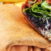 Olson'S Cranberry Chicken Wrap · Signature house wrap prepared with mixed greens, grilled chicken, craisins, almonds, and fet...