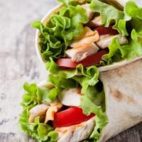 House Wrap · Signature house wrap prepared with mixed greens, cucumber, tomato, carrot, red onion, Parmes...