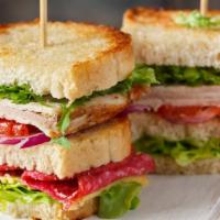 Grilled Turkey Club Sandwich · Mouthwatering House special sandwich prepared with Oven roasted turkey, bacon, melted chedda...