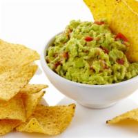 Chips & Guacamole · Delicious, corn tortilla chips served with a homemade guacamole.
