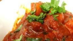 Chicken Curry · Boneless chicken cooked with Indian spices and curry sauce.