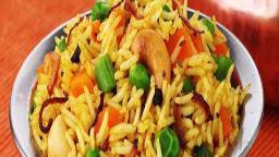 Vegetable Biryani · Basmati rice and mixed vegetables cooked with medium spices.