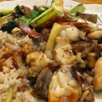 Hibachi Twin Lobster Tail (D) · Includes clear onions soup, green salad with Honda ginger dressing, shrimp appetizer, fried ...