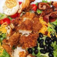 Southwestern Cobb Salad · Mixed greens, bacon, black beans, avocado, tomato, deviled eggs, cheddar cheese, and pimento...