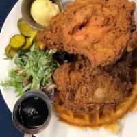 Chicken & Waffles · Buttermilk fried chicken and Anson Mills rice waffle with whipped honey butter and house bre...
