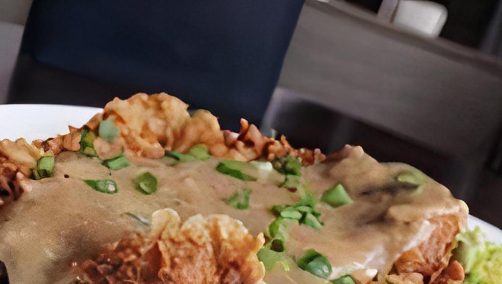 Chicken Fried Steak · Beef top sirloin smothered in country gravy, with garlic-buttermilk mashed potatoes and smokey bacon green beans.