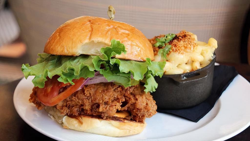 Fried Chicken Sandwich · with Bubba’s remoulade, tomato, lettuce, and bread-and-butter pickles, on South Union brioche. Make it Hot, Big Willy Style for an additional charge.