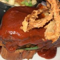 Meatloaf Sandwich · Blend of beef, pork, and bacon, smothered in spicy BBQ sauce, with fried onion strings; open...