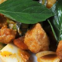 Basil Spicy · Your choice of tofu, chicken, beef or shrimp in a slightly spicy red curry sauce with bell p...