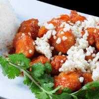 Sweet & Spicy · Tofu, chicken, beef or shrimp in a sweet and spicy sauce topped with puffed rice and served ...