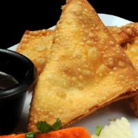 Crab Wonton (4 Pc) · Crispy wonton shells filled with a blend of cheese, green onion, and crab meat: served with ...