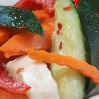 Pickled Vegetables · Spicy pickled cucumber, carrot and daikon.