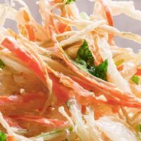 Kakiage · Thinly cut vegetables fried in a light tempura batter.