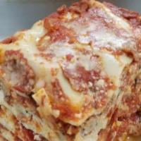 Lasagna · Homemade with meat and cheese.