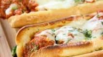 Meatball Sub · Red Sauce, Provolone, Fresh Basil, Oregano, Italian Loaf.
**meatballs contain dairy and gluten