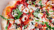 Margarita Pizza · House Mozzarella, Fire Roasted Tomato, Parmesan, Fresh Basil.