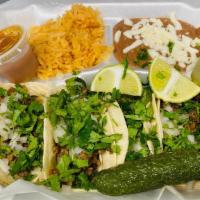 Combo # 1  - 4 Tacos  Rice And Beans  · Choice of meat