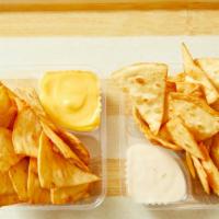 Corn Nachos With Queso Blanco · Corn Chips with a side of Queso Blanco