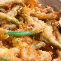 Fried Green Beans · Basket of cut green beans fried. Served with spicy aioli.