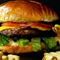 Steakburger · A 6 oz. juicy steak burger with American cheese, topped with our regular burger toppings.