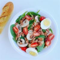 Perfect Spinach Salad · Baby leaf spinach, grape tomatoes, sweet red onions, boiled eggs, fresh mushroom topped with...