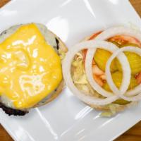 Cheeseburger · Cheeseburger topped with choice of cheese. Add  hickory smoked bacon for an additional charge.