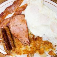  Hungry Man Breakfast · Best seller! Three eggs any style, ham, hickory smoked bacon & sausage, home fries.