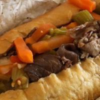 Italian Beef · Traditional thinly sliced italian beef served on fresh french bread, your choice of: dry, di...